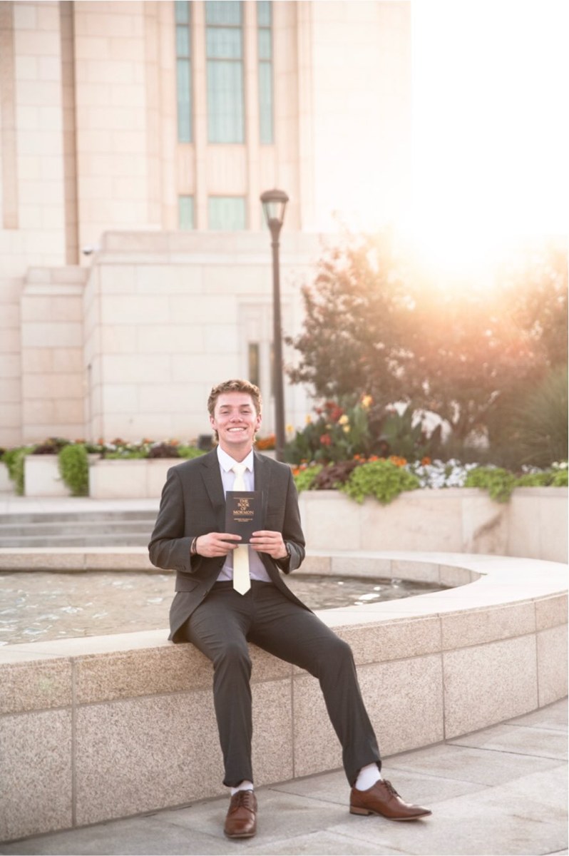 Elder Archibald sitting by the temple fountain